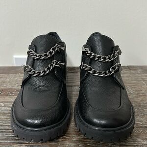 Women’s Schutz Lug Sole Ruteh Loafer Black Leather Gunmetal chain detail US 7.5
